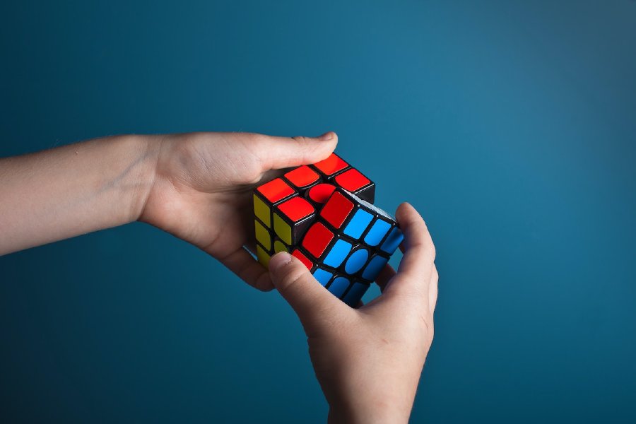 Person solving rubics cube